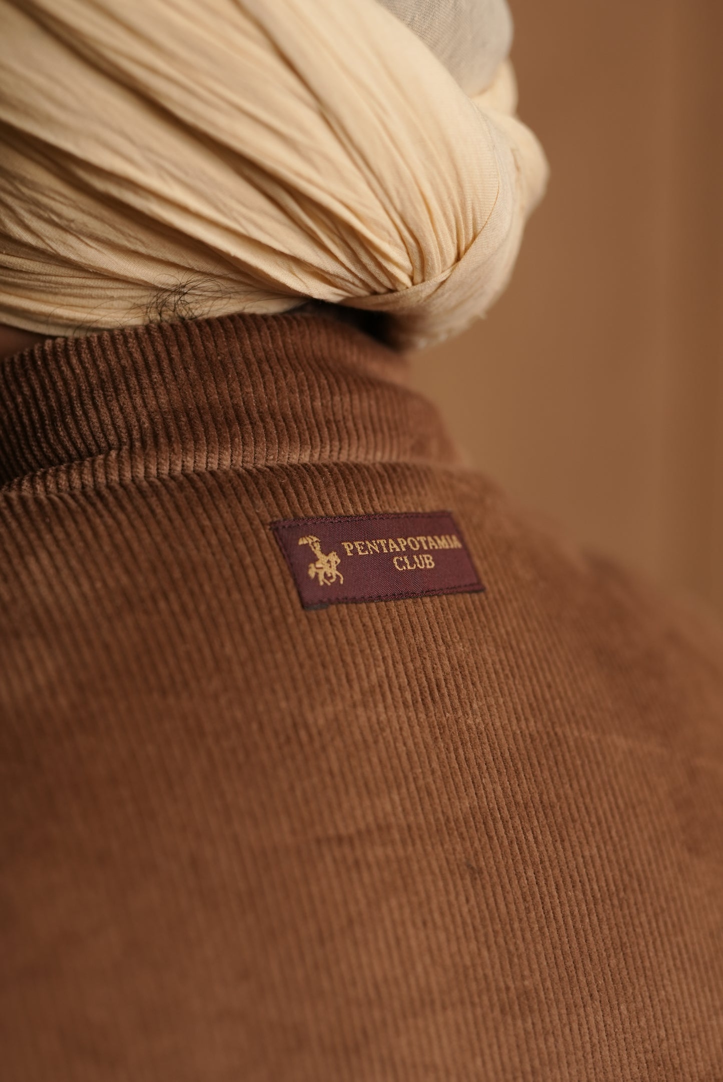 GENTLEMAN’S CORD PUFFER JACKET - TAN